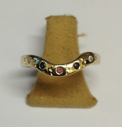 Stone set shaped ring