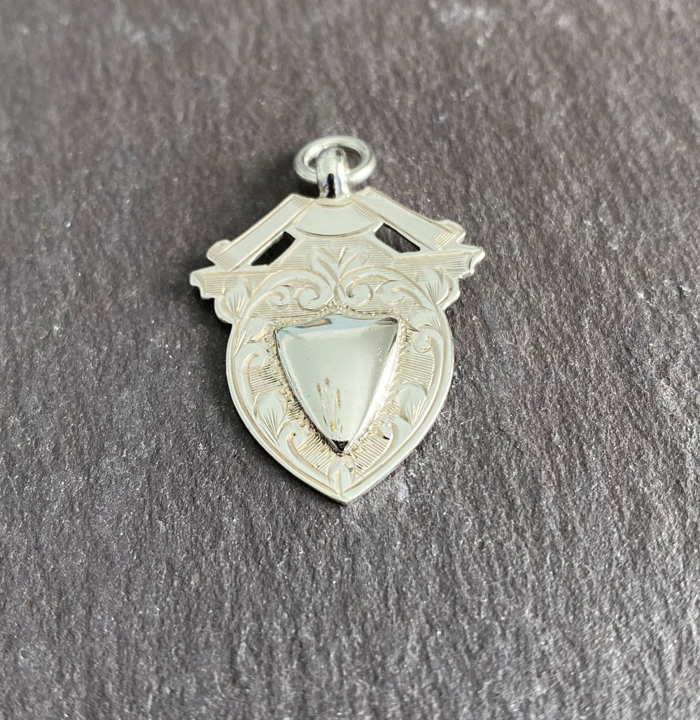 Silver Medallion Clement White